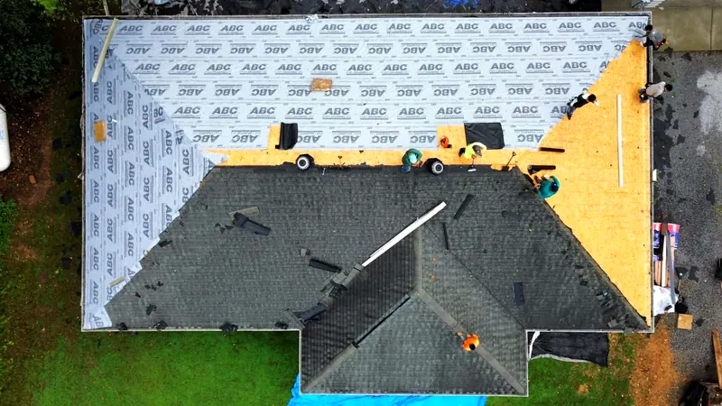 Crew laying new underlayment