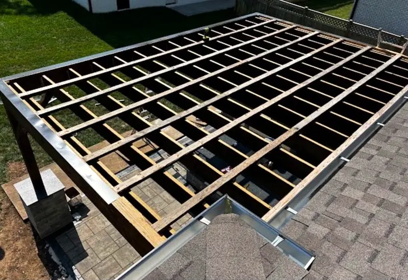 Open pergola frame from above, before the metal roof